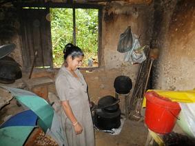 Sujatha with cooking utensils after loan from WDC